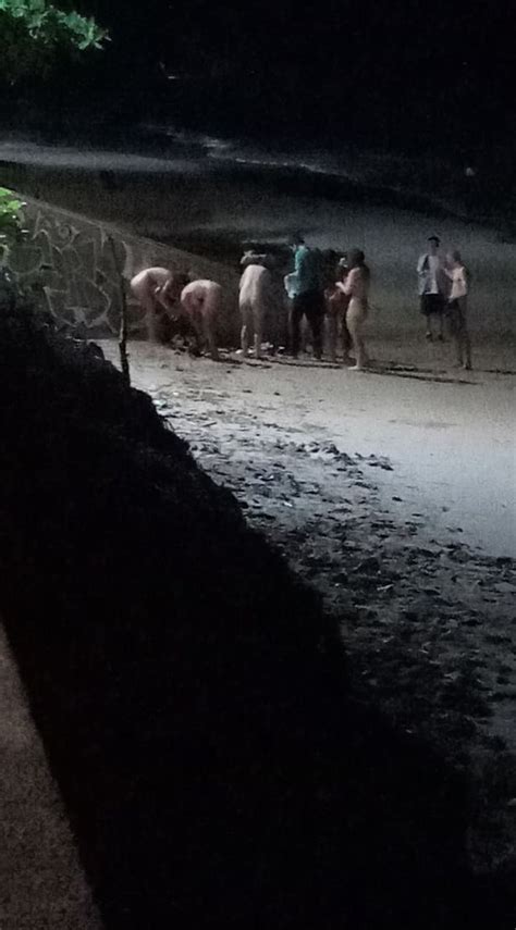 Six naked tourists including Brit arrested for skinny dipping on .